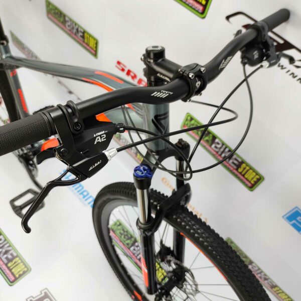 Bicicleta-guayaquil-mtb-montañera-talla-mega-bike-store-bike-shimano-gw-bicicleta -montaña-jaguar-aluminio-aro-29-gris-naranja